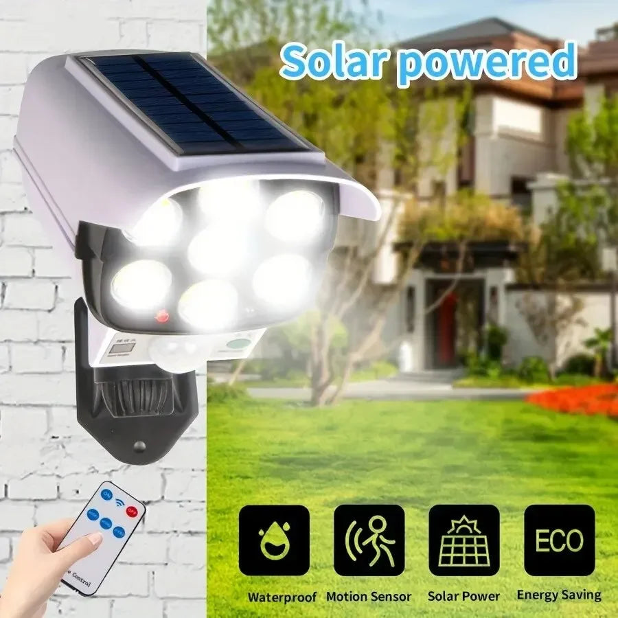 IWPI 77 LED Motion Sensor Solar Flood Light Decoy Camera